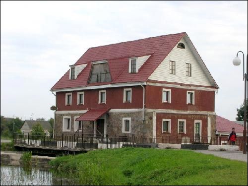  - Młyn wodny . Fasada główna i boczna