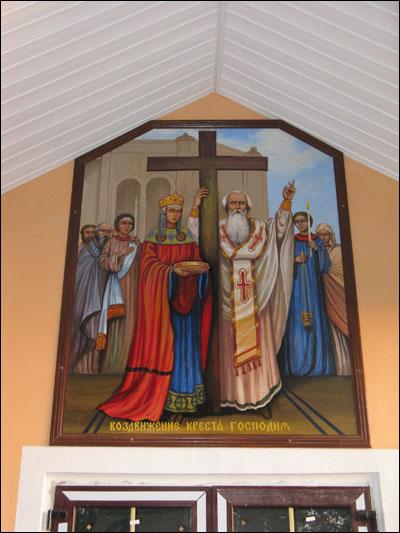Icon of the Exaltation of the Holy Cross under the plastic siding Hoščava. Orthodox church of the Exaltation of the Holy Cross